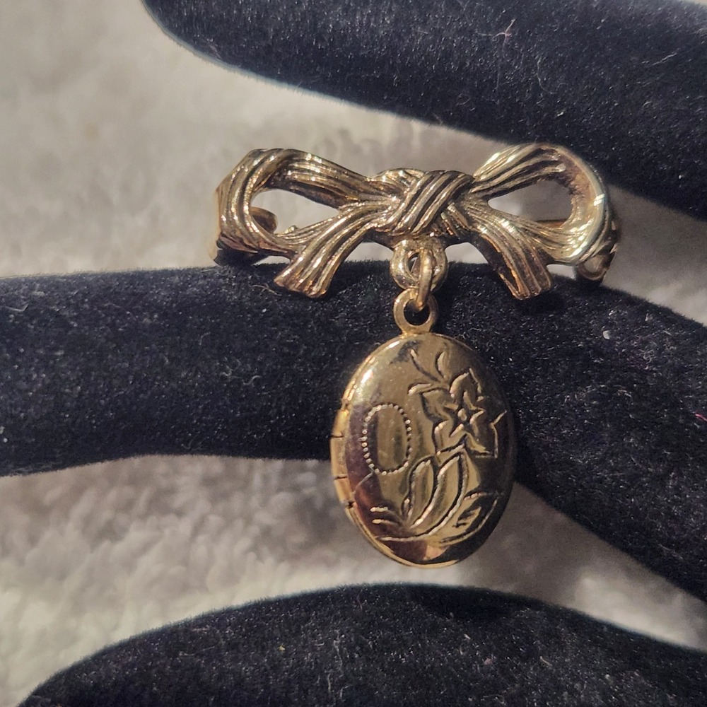 Vintage Gold Tone Bow Brooch with Engraved Floralâ Oval Dangle Locket Pin